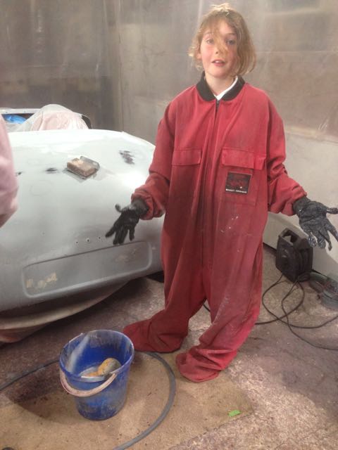 Ella helping with rubbing down