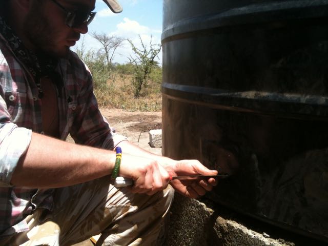 Making the tap hole with a knife!